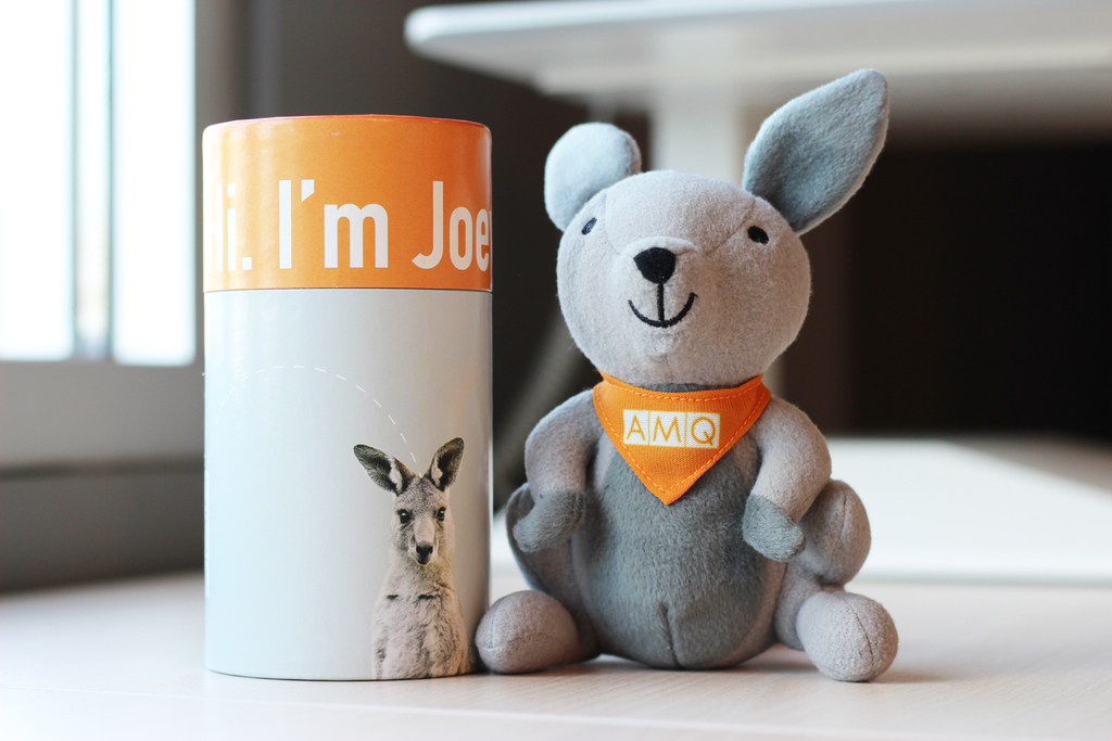 AMQ Solutions branded stuffed animal